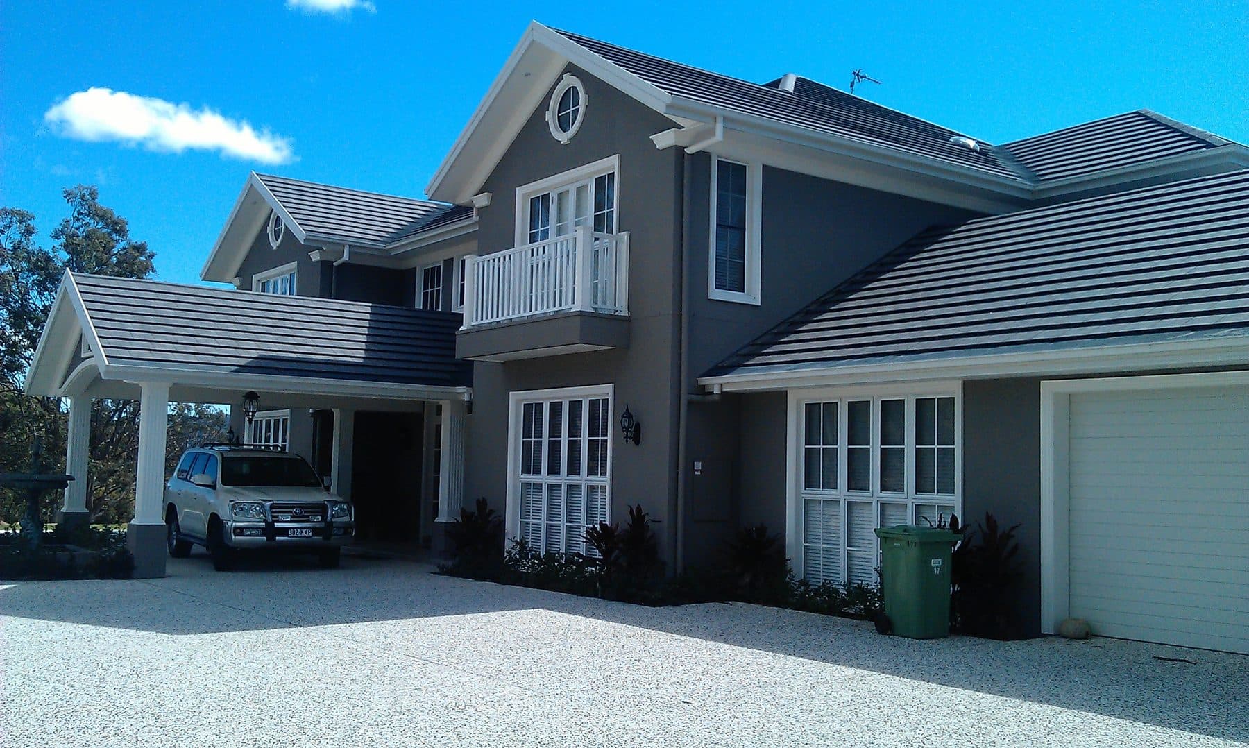 A two-storey Queensland home with gutter guard fitted along the rooflines